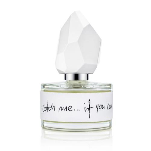 Naturalne niszowe perfumy yDe Catch Me... If You Can w szklanej butelce 50ml oklejonej żakardową tkaniną w kolorze białym i rzeźbionym białym korkiem.